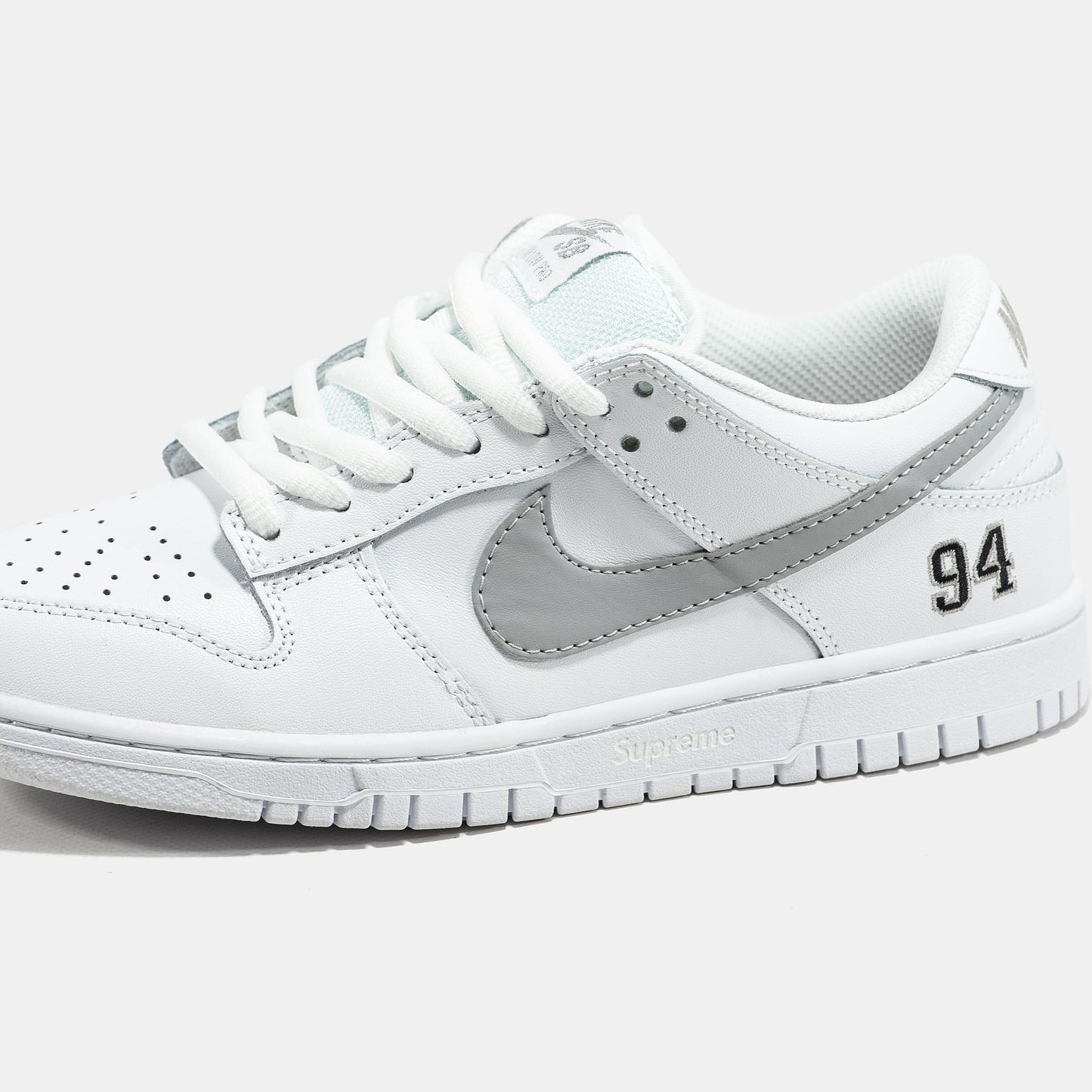 Nike SB Dunk Low x Supreme White Grey Logo