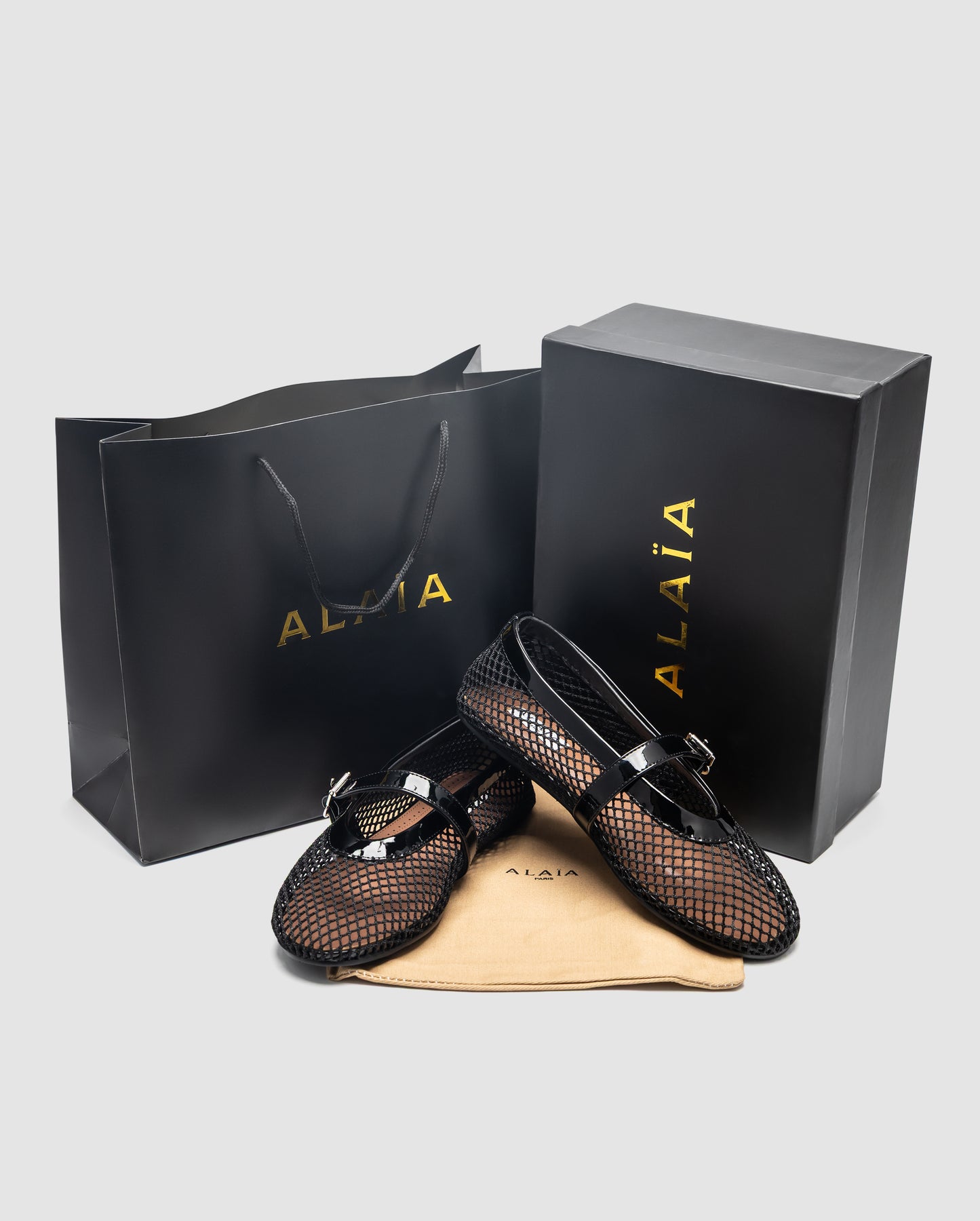 Alaia Ballet Flats in Fishnet Black